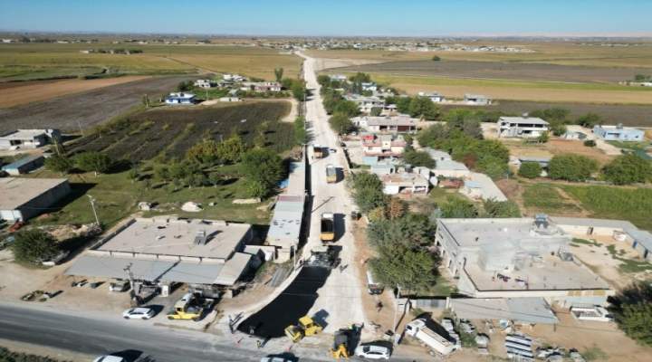 İmam Bakır Türbesinin yoluna yakıyır asfalt çalışması